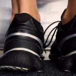 black and gray running shoes