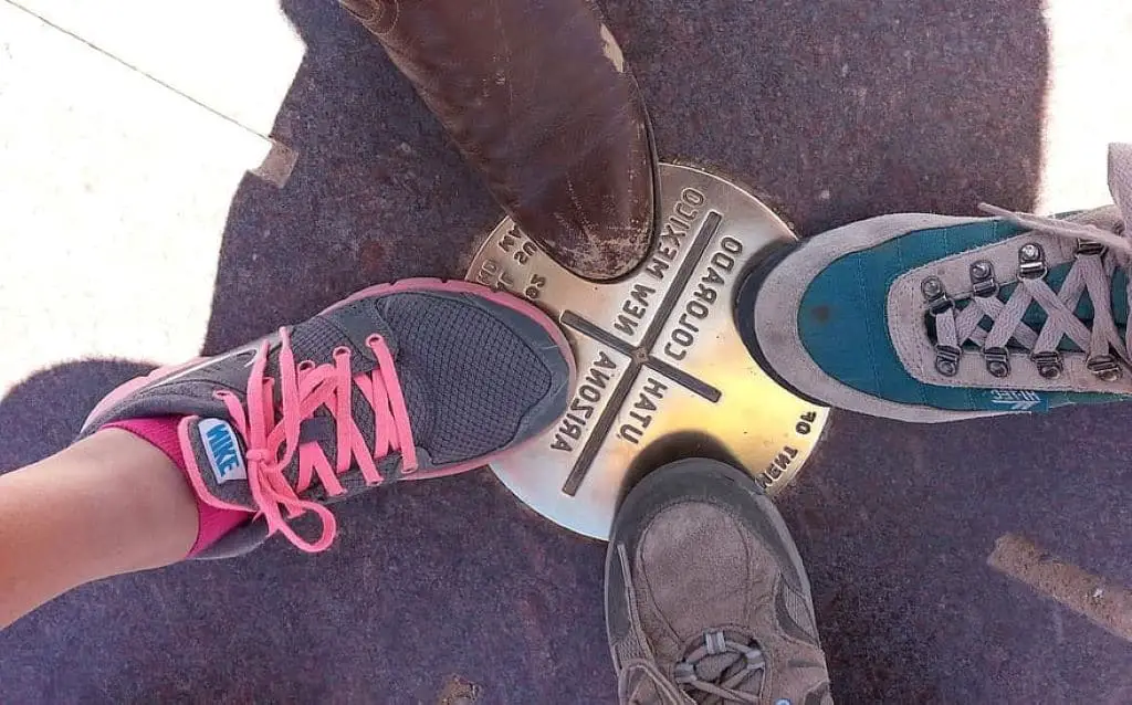 four corners with shoe, boot, sneaker and laces
