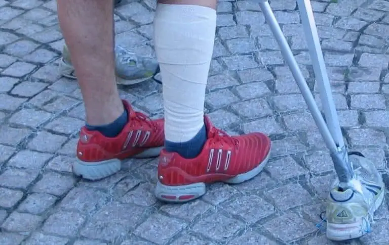 man in crutches