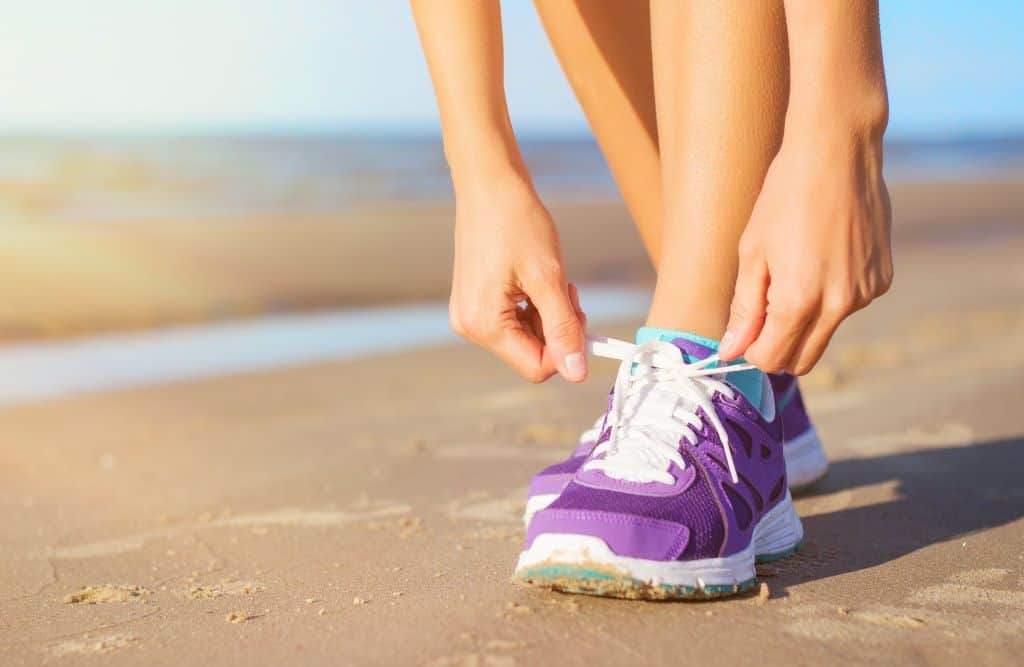 woman in sports shoes and sportswear