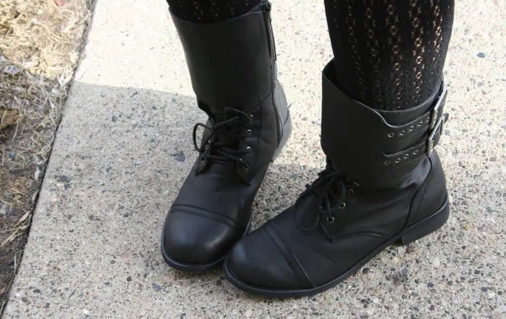 Black Leather Boots On Women's Feet