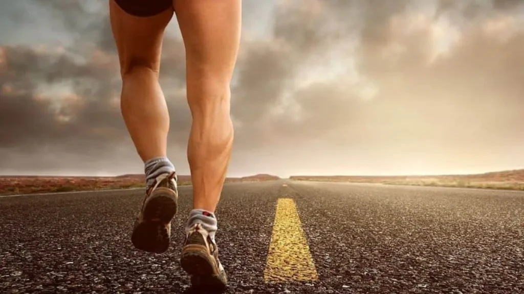 Runner wearing cushioned shoes on a long road run